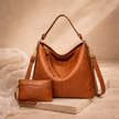 FJØRNA faux leather hobo shoulder bag for women, vegan leather tote with adjustable strap and spacious interior.