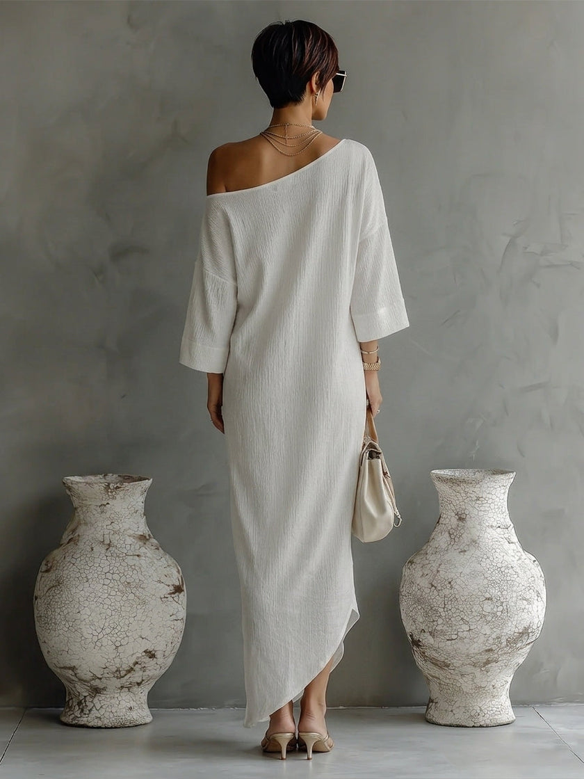 Women's ivory white cotton-linen blend mini dress by FJØRNA, featuring a stylish, lightweight summer dress with a relaxed fit.