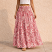 FJØRNA women's high waist maxi skirt with paisley print, flowing fabric, and elegant design.