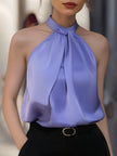 Lavender satin blouse for women by FJØRNA featuring a cross neckline and gathered sleeveless design.