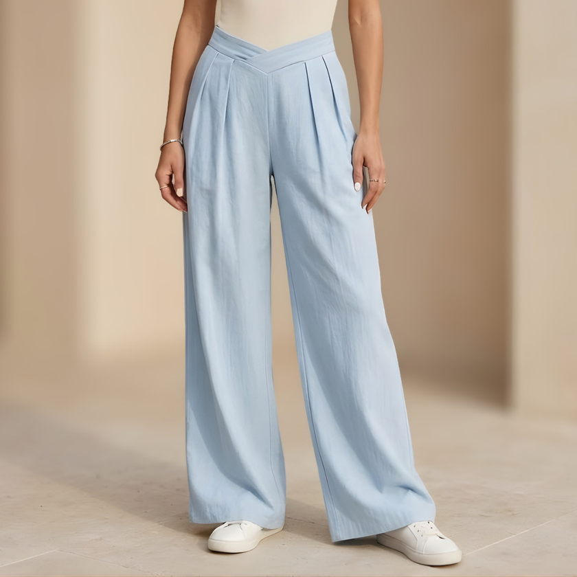Women's FJØRNA criss-cross waist wide-leg trousers, showing the stylish high-waist design and flowing wide-leg cut.