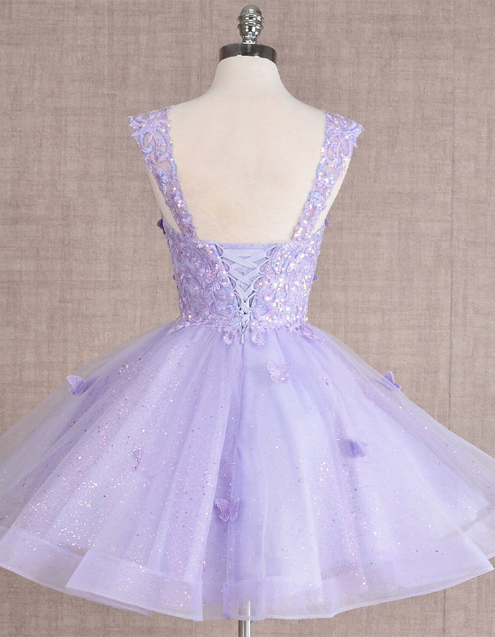 Mint green FJØRNA sleeveless tulle cocktail dress for women, featuring a fitted bodice and flowing tulle skirt.