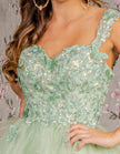 Mint green FJØRNA sleeveless tulle cocktail dress for women, showcasing a flowy, elegant design with intricate tulle fabric.