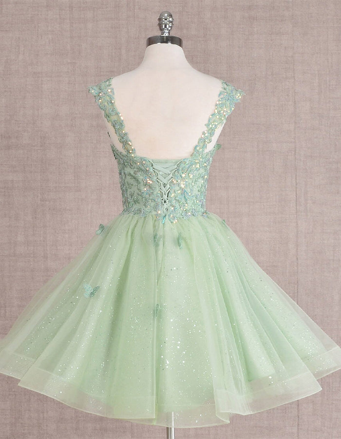 Mint green FJØRNA sleeveless tulle cocktail dress for women, featuring a fitted bodice and flared skirt.