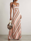 FJØRNA elegant crochet printed open-back women's maxi dress for summer, featuring intricate patterns and flowing fabric.
