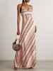 FJØRNA elegant crochet printed open-back women's maxi dress for summer, featuring intricate patterns and flowing fabric.