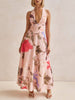 FJØRNA floral print halter backless tie-up women's maxi dress, flowing fabric with vibrant floral pattern and open back design.