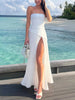 FJØRNA elegant wrap neckline pleated high slit women's maxi dress displayed on a model, showcasing sophisticated evening wear.