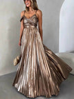FJØRNA elegant V-neck backless pleated suspender maxi dress displayed on a model, showcasing its flowing design and stylish details.