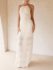 FJØRNA women's maxi dress with delicate hollow pleats, lace-up detail, ideal for evening wear, featuring a flowing silhouette.