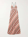 FJØRNA elegant crochet printed open back women's maxi dress for summer, featuring intricate patterns and flowing fabric.