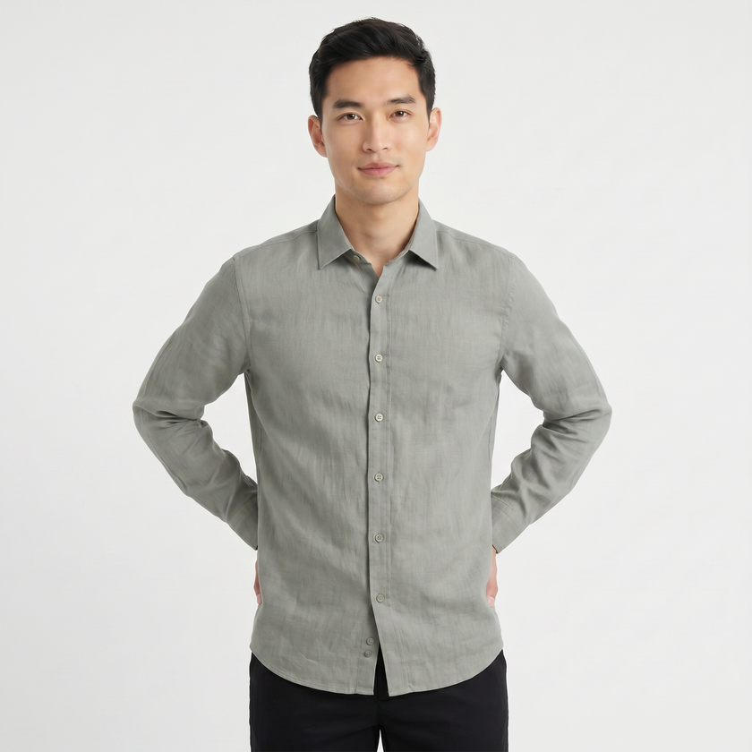 Men's FJØRNA long sleeve linen button-down shirt shown on a hanger, lightweight breathable fabric, neutral color, casual style.