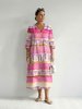 FJØRNA women's summer midi dress with striped pattern, long sleeves, flowy relaxed fit, ideal for warm weather.