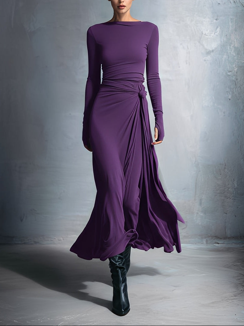 Flowy FJØRNA summer maxi dress for women featuring a wrap design and lightweight fabric, perfect for warm weather.