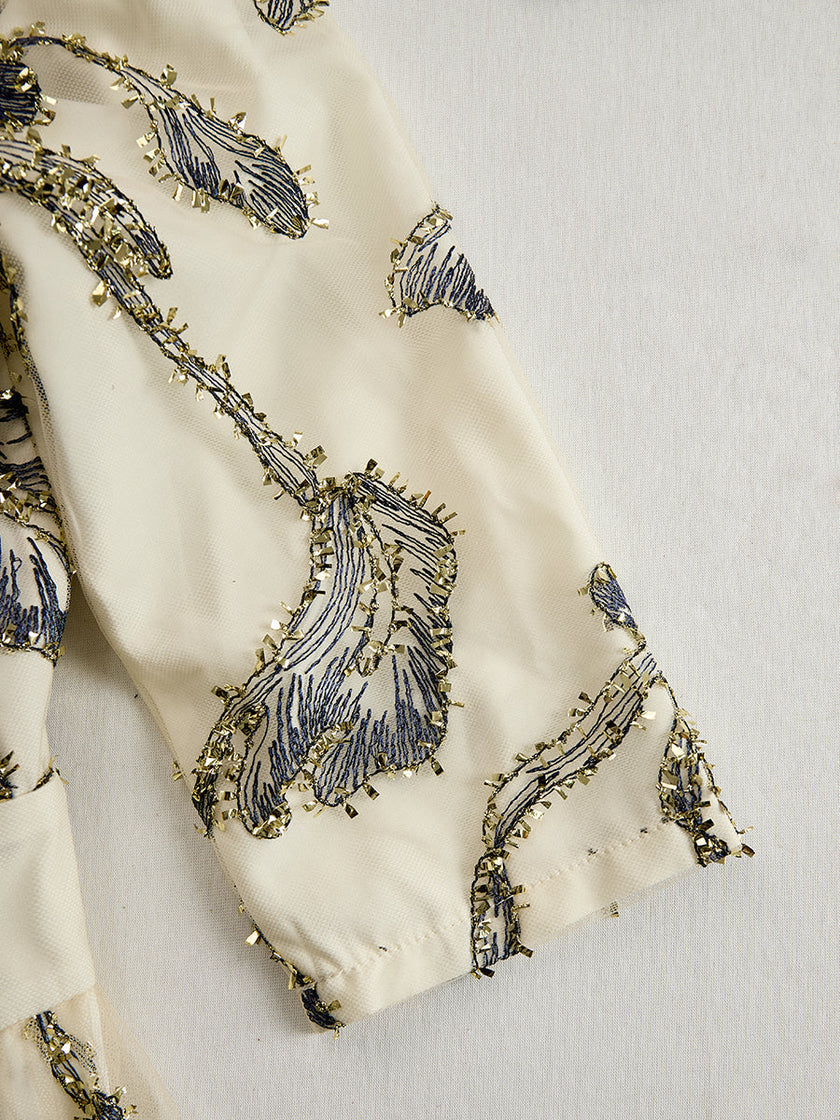FJØRNA silver embroidered mesh midi dress with metallic leaf motif, elegant design, featuring intricate embroidery and sheer fabric.