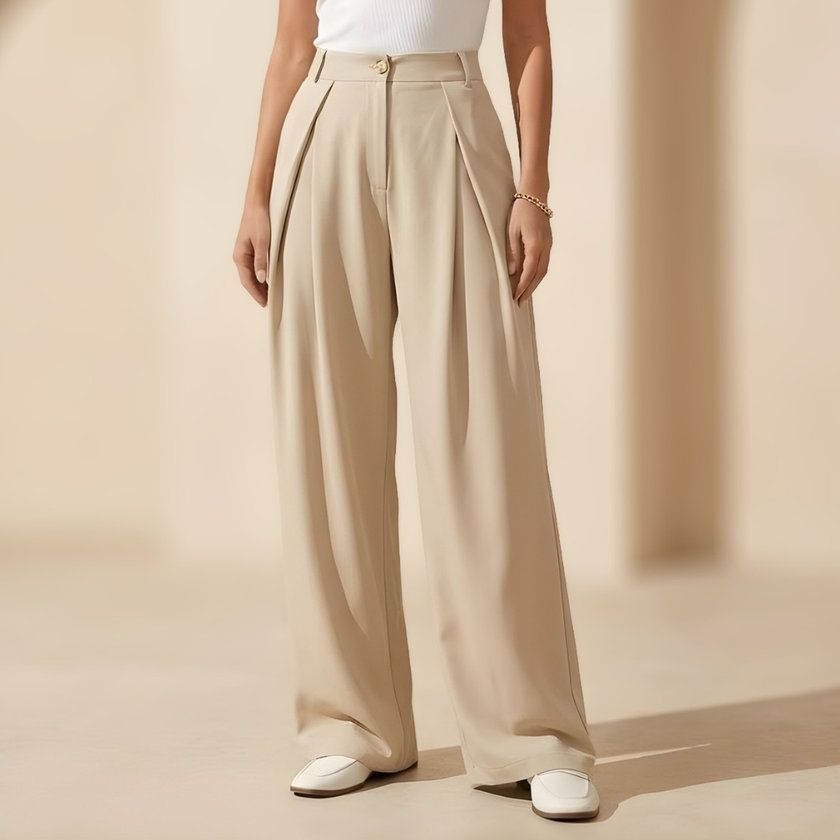 Women’s high waisted wide leg tailored trousers by FJØRNA, featuring a sleek fit and classic design, displayed on a white background.