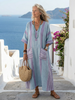 FJØRNA summer midi dress for women featuring short sleeves, wrap design, flowy lightweight fabric, suitable for warm weather.