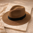 FJØRNA Carolous men's handcrafted classic Panama hat with a wide brim and natural straw texture, stylish and elegant for warm weather.
