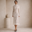 Ivory lace midi dress for women with high neck, elegant FJØRNA dress featuring intricate lace details and a fitted silhouette.