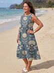 FJØRNA women's floral sleeveless summer midi dress with wrap design, lightweight and stylish for warm weather occasions.
