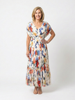 FJØRNA women's floral pleated summer midi dress with lightweight fabric and feminine design, ideal for warm-weather occasions.