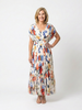 FJØRNA women's floral pleated summer midi dress with lightweight fabric and feminine design, ideal for warm-weather occasions.