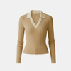 Slim fit long sleeve knit top for women by FJØRNA, featuring a stylish and cozy design in soft fabric.