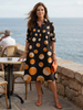 FJØRNA women's summer dress with polka dots, featuring pockets, lightweight casual style, perfect for warm weather.