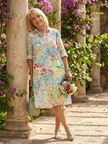 FJØRNA women's floral summer dress with pockets, casual and breathable fabric, perfect for warm weather.