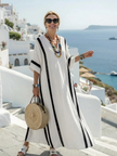 FJØRNA women's summer maxi dress with striped pattern, short sleeves, wrap style, flowy fabric, ideal for warm weather.
