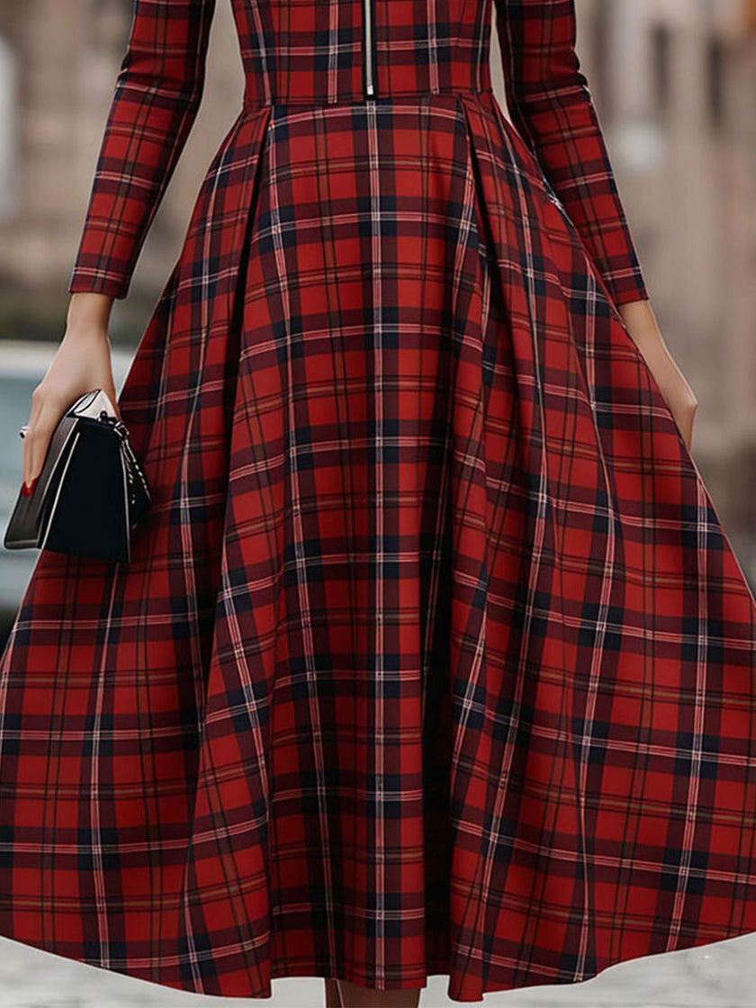 FJØRNA elegant long sleeve plaid dress with a classic and contemporary design, featuring a fitted waist and stylish pattern.