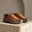 Red leather men's orthopedic shoes by FJØRNA, featuring supportive design and stylish appearance for comfortable everyday wear.