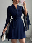 White FJØRNA A-line dress with elastic waistband, see-through fabric, interlace design, and split-joint details.