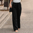 FJØRNA Jane women's wide-leg pants with high waist and drawstring, casual style, shown in a neutral fabric and relaxed fit.