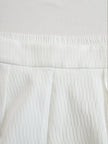 Cream textured lantern sleeve two-piece pants set by FJØRNA, featuring lantern sleeves and matching coordinated pants.