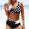 FJØRNA women's bikini set with wrap top, featuring a stylish swimwear design perfect for beach or poolside lounging.