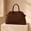 Vegan large suede handbag for women from FJØRNA, featuring a spacious design and stylish silhouette.
