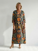 FJØRNA women's floral summer midi dress with long sleeves, wrap style, tailored fit, perfect for warm weather and casual occasions.