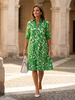 FJØRNA women's summer dress with pockets, casual style, lightweight fabric, and sleeveless design perfect for warm weather.