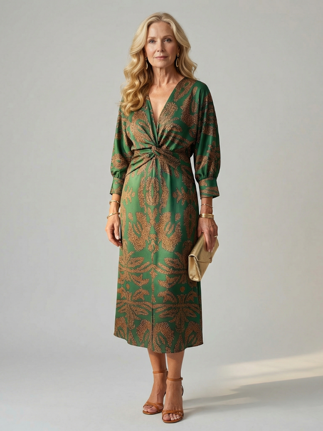 FJØRNA women's summer midi dress with long sleeves, wrap style, in light, flowy fabric, perfect for warm weather.