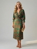 FJØRNA women's summer midi dress with long sleeves, wrap style, in light, flowy fabric, perfect for warm weather.