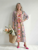 FJØRNA women's summer midi dress with floral pattern, long sleeves, wrap style, flowy fabric, perfect for warm weather.