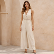FJØRNA women's lace two-piece suit set with sleeveless top and wide-leg pants, stylish and elegant for modern fashion.