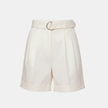 FJØRNA women's high waist pleated shorts, stylish and comfortable pants with a flattering fit, shown in a natural pose.