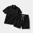 FJØRNA men's linen short sleeve polo shirt and matching shorts set, lightweight and casual summer outfit, front view.
