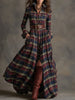 Brown FJØRNA maxi casual dress with flowing fabric and sleeveless design, perfect for warm weather and relaxed occasions.