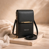 FJØRNA women's anti-theft travel crossbody bag with adjustable strap and secure zipper closure, designed for safe travel.