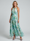 FJØRNA women's summer midi dress with floral print, halter neck, sleeveless design, and pleated skirt.