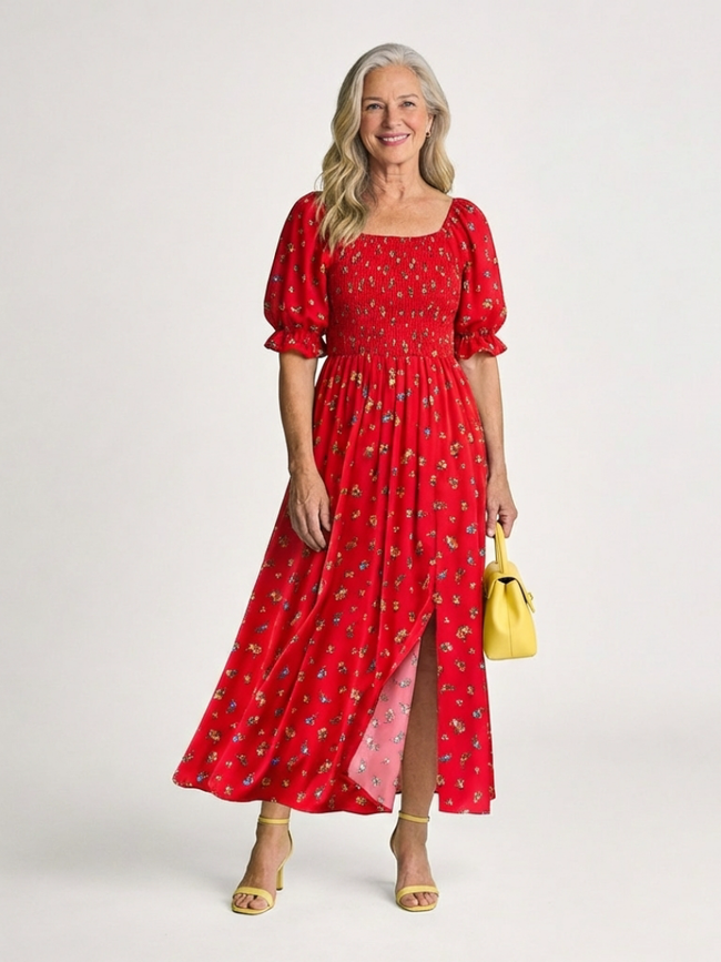 FJØRNA women's floral summer midi dress with square neckline and puff sleeves, featuring a vibrant floral pattern and flowy silhouette.