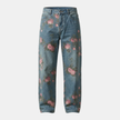 Men's denim jeans by FJØRNA with floral pattern, stylish casual pants featuring classic denim fabric and floral design.